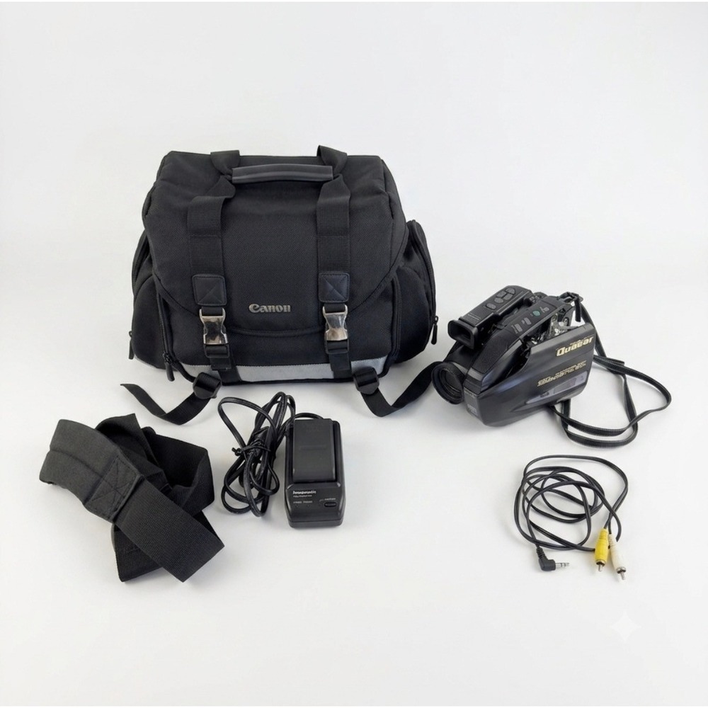 Vintage Quasar VM-D51 VHS-C Camcorder 150x Digital Zoom Tested/Works with extras